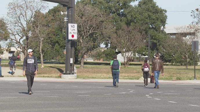 students walk through intersection